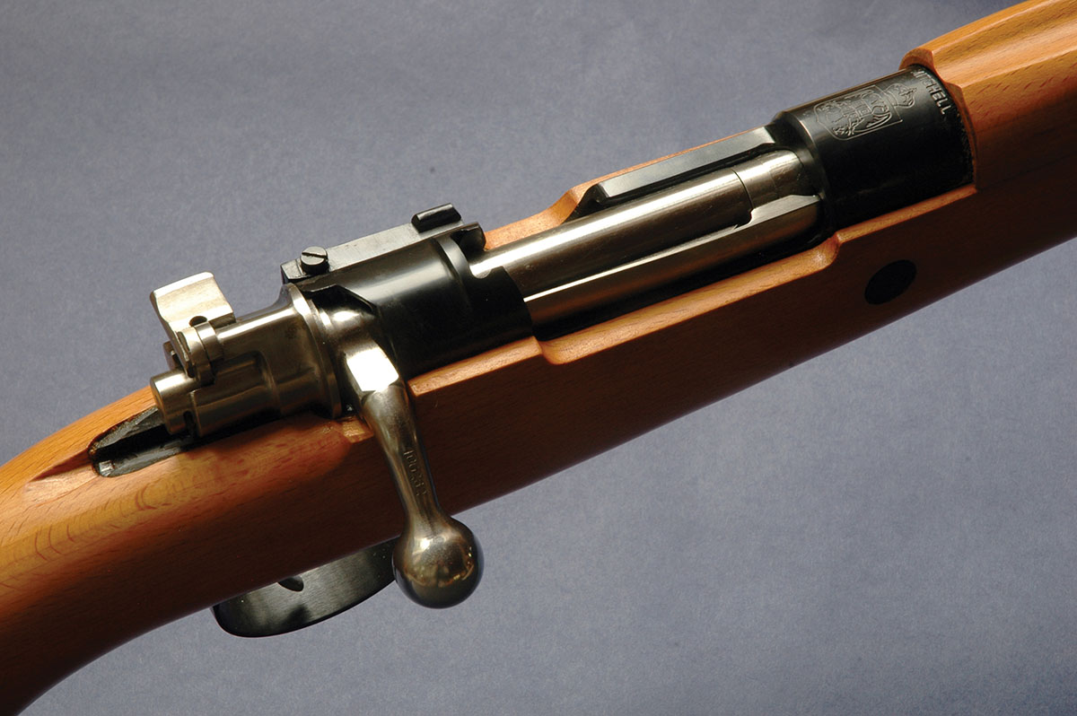 Vintage 1898: the non-rotating extractor and collar – as well as clip and thumb slots, flag safety, bolt and release.